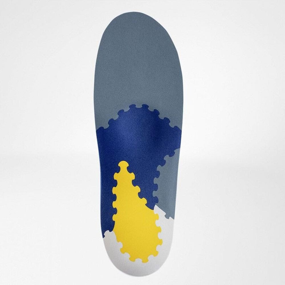 TRIactive® Soft heel 3 Zwart-witte schoen met abstract luierachtige geel-blauwe vormgeving en silhouet van blokken op middelgrote sneaker.