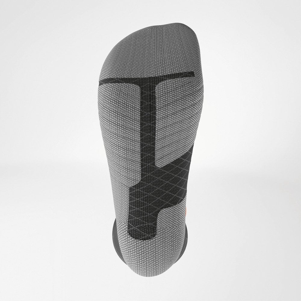 Ski Performance Compression Socks 4 Lichtgrijs sportkussen of silicone knie- of beenkussen met zwarte geometrische patronen en naadloze textuur, geschikt voor fysiotherapie en knieondersteuning.