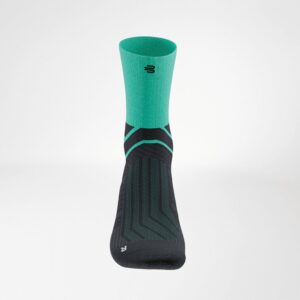 FRISKFYSIO sportkousen met turquoise bovenstuk en zwarte, geometrische patronen voor ondersteuning en comfort bij training.