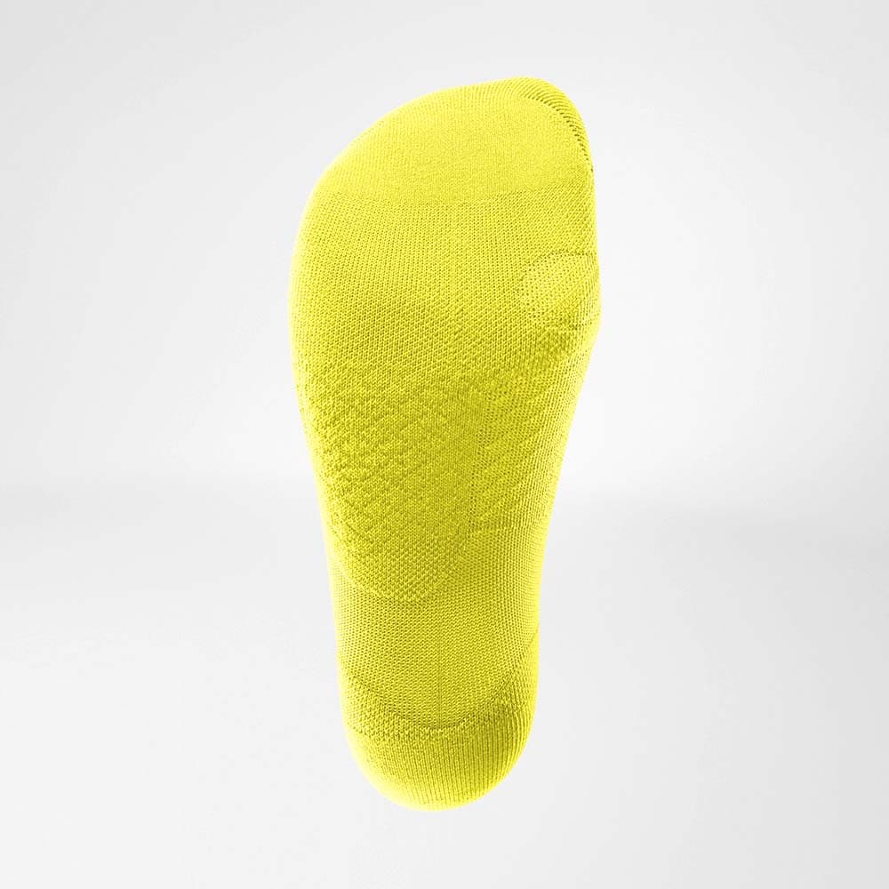 Run Ultralight Low-Cut Socks 4 Bright yellow sports socks with no visible labels on a white background.