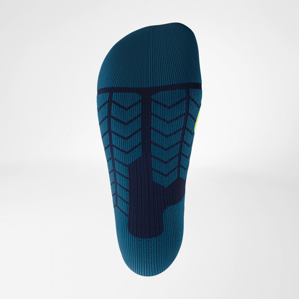 Ski Touring Compression Socks 4 Frisk Fysio compression trousers or knee brace featuring a patterned design, shades of blue and illustrated heel motifs, designed for sports rehabilitation and physiotherapy.