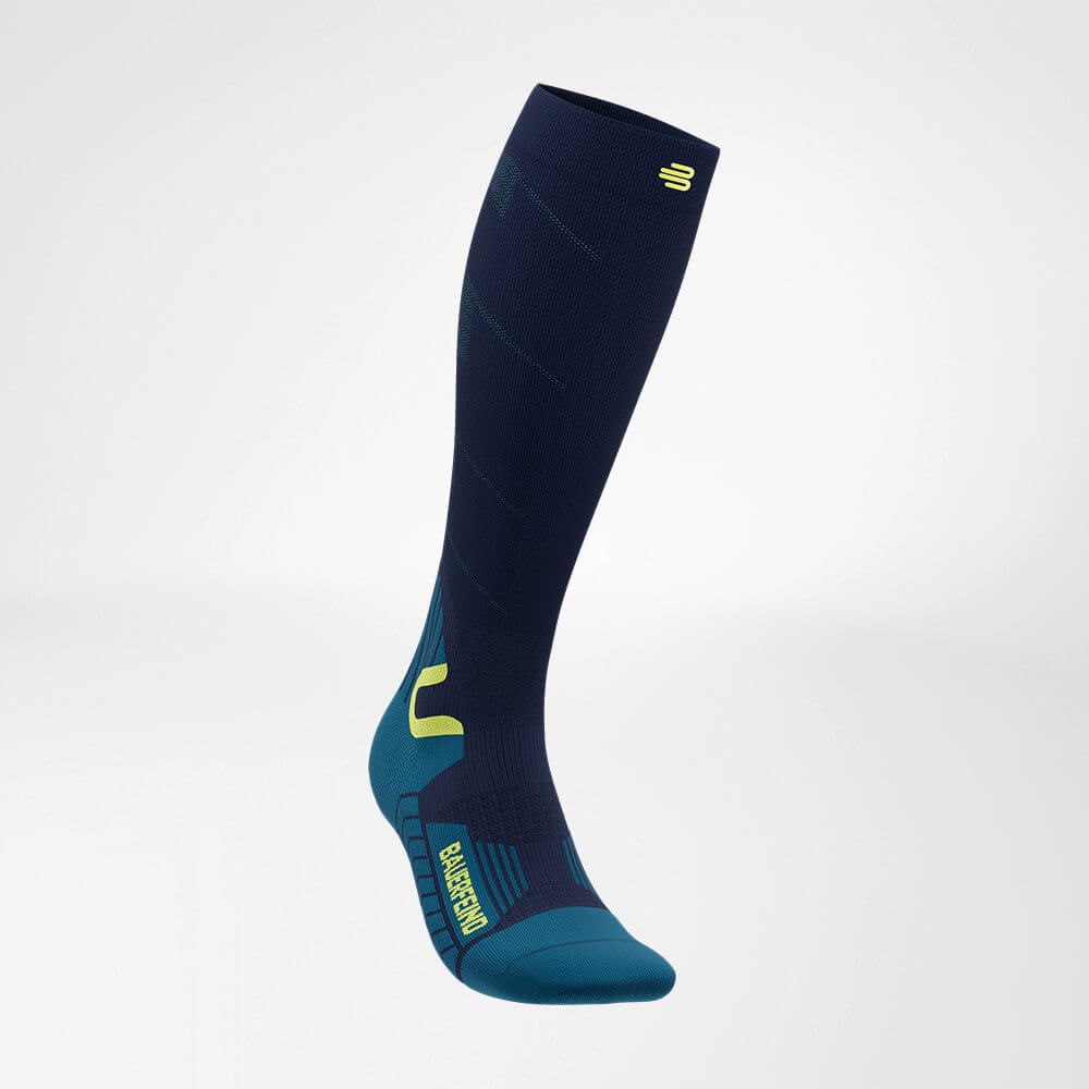 Ski Touring Compression Socks 2 Frisk Fysio sportswear: dark blue calf/compression socks with light green-blue accents and the brand logo at the top.