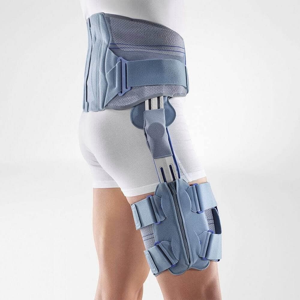 SofTec® Coxa 1 Draagbrace voor knie en bovenbeen met steunbanden en verstelbare sluitingen, gericht op ondersteuning bij knie- en heupletsel.